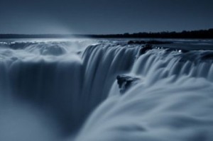 Iguazu falls at night full moon